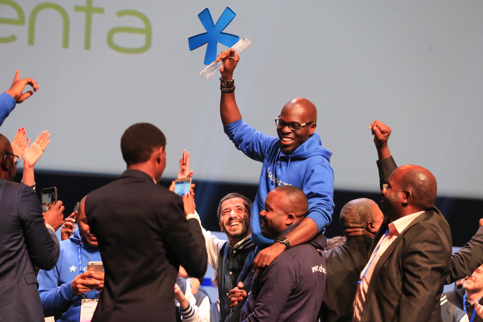 A Seedstars startup competition winner celebrating on stage